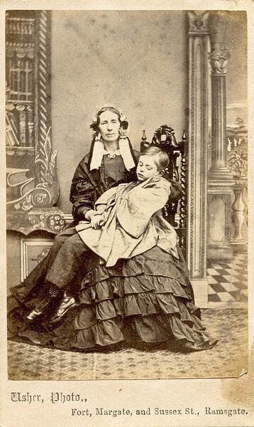 Post_mortem_CDV_of_a_woman_holding_her_son_25480579504-1-511415554