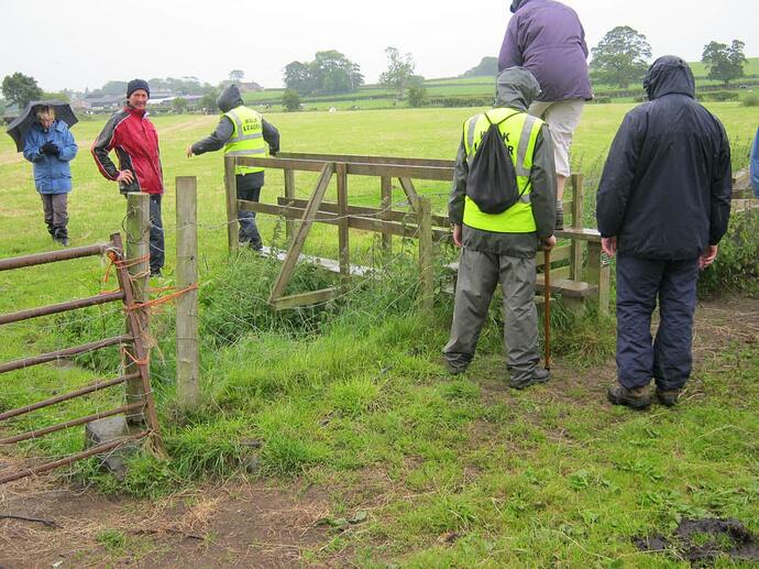 10a Timber_Double-Step_Pole_&_Rail_Stile_Onto_Timber_Footbridge_In_Field