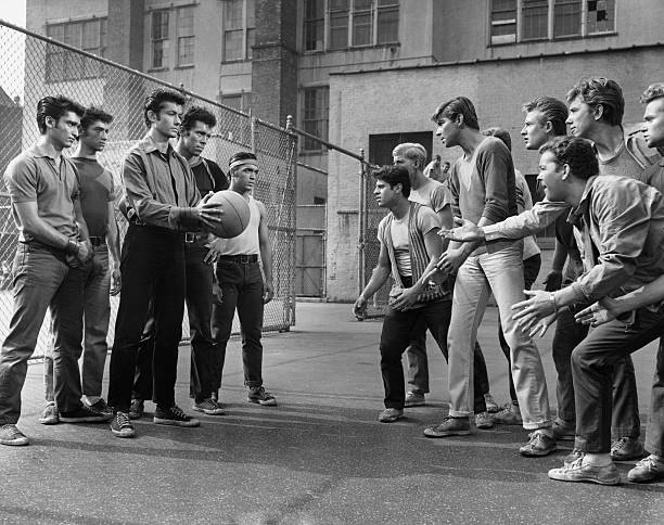rival-gang-members-face-off-in-a-play-yard-in-a-publicity-still-for-picture-id526898262-2390455881